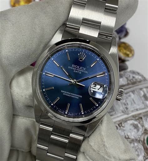 rolex oyster perpetual date 15200 blue dial arabic